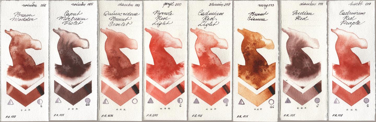 Winsor & Newton Professional 056 Brown Madder, 125 Caput Mortuum Violet, Daniel Smith 087 Quinacridone Burnt Scarlet, Golden QOR 200 Pyrrole Red Light, Shminke Horadam Aquarell 349 Cadmium Red Light, Rosa Gallery 733 Burnt Sienna, 044 Indian Red, Holbein Artists Watercolor 017 Cadmium Red Purp watercolor swatch