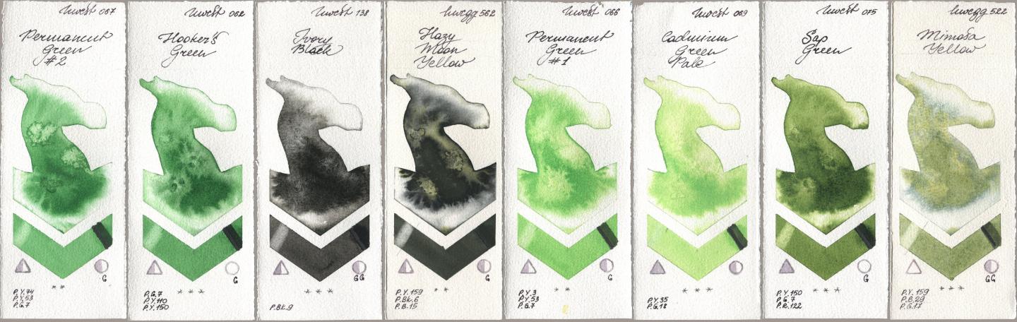 Holbein Artists Watercolor 067 Permanent Green No 2, 062 Hookers Green, 138 Ivory Black, 562 Hazy Moon Yellow, 066 Permanent Green No 1, 069 Cadmium Green Pale, 075 Sap Green, 522 Mimosa Yell watercolor swatch