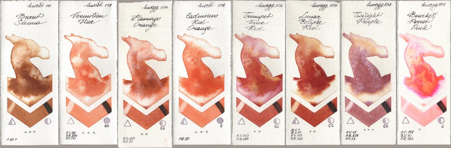 Holbein Artists Watercolor 134 Burnt Sienna, 019 Vermilion Hue, 504 Flamingo Orange, 016 Cadmium Red Orange, 502 Trumpet Vine Red, 505 Lunar Eclipse Red, 543 Twilight Purple, 501 Bourkes Parrot Pi watercolor swatch